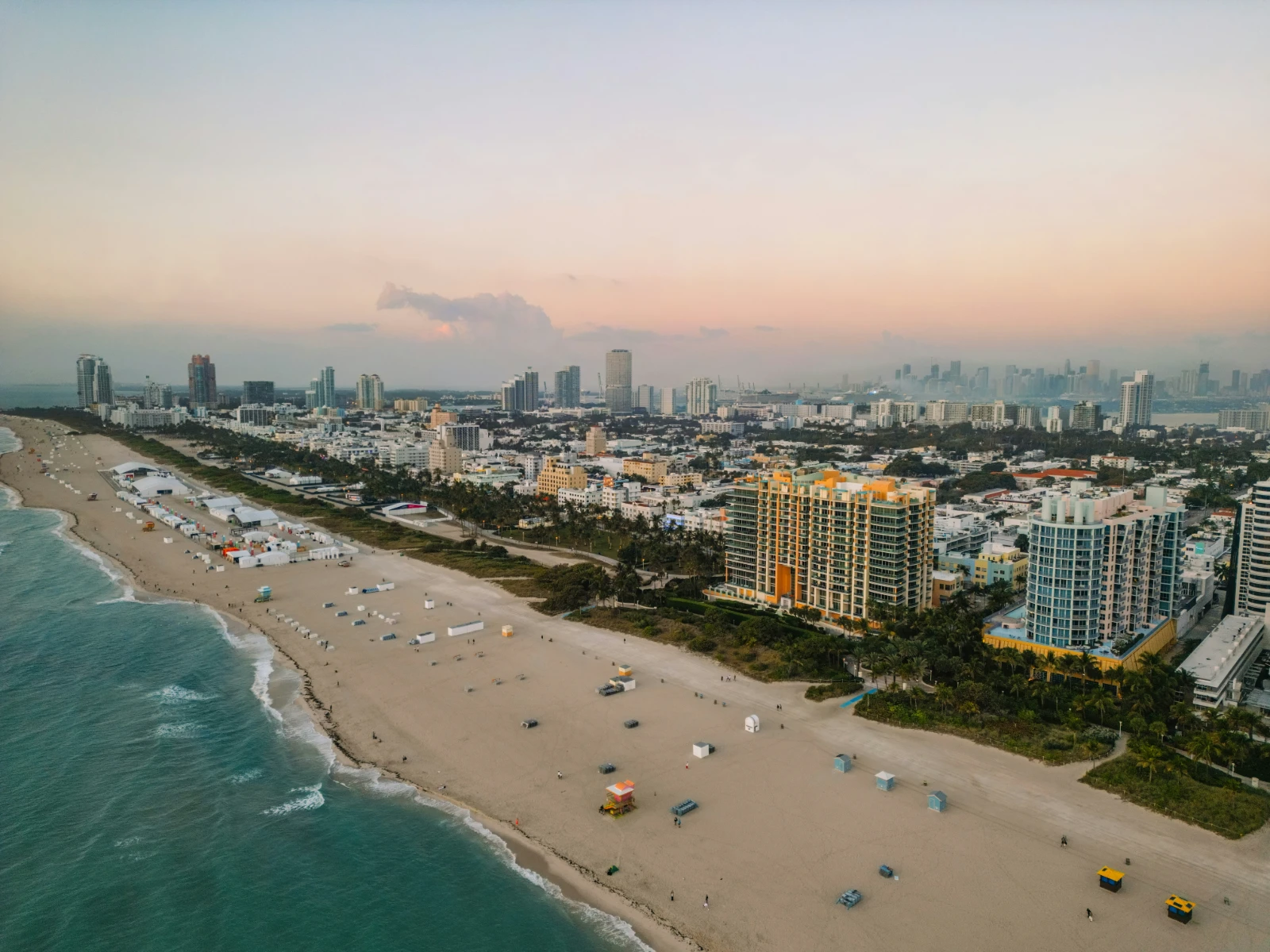 Miami Beach shoreline with the Miami skyline at sunset